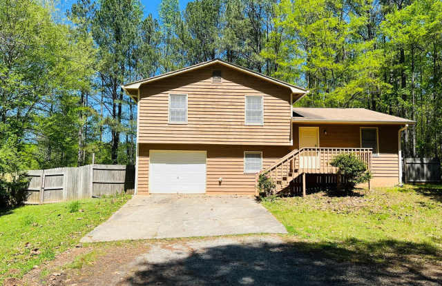 Great location, large wooded and fenced yard, private setting, newly renovated, partial basement w/storage, must see! photos photos
