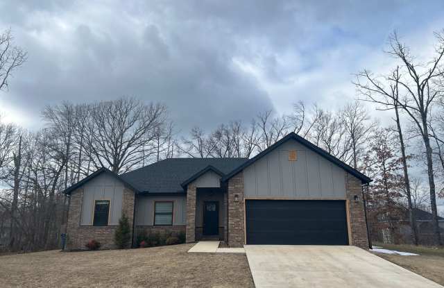 This home is a must-see in Bella Vista, offering a blend of comfort, functionality, and beauty that is hard to resist. photos photos