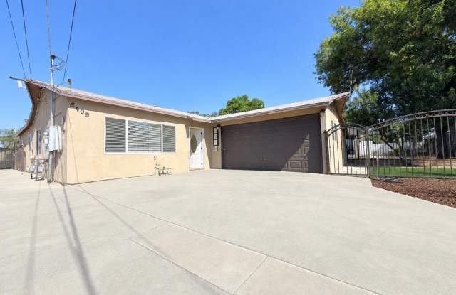 Spacious 4-Bedroom, 2-Bath Gated Home with Garage & Private Backyard photos photos