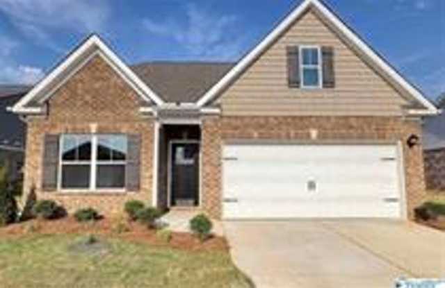 COMING SOON! Welcome to the Carlyle—where classic brick farmhouse charm meets a sleek, modern lifestyle! photos photos