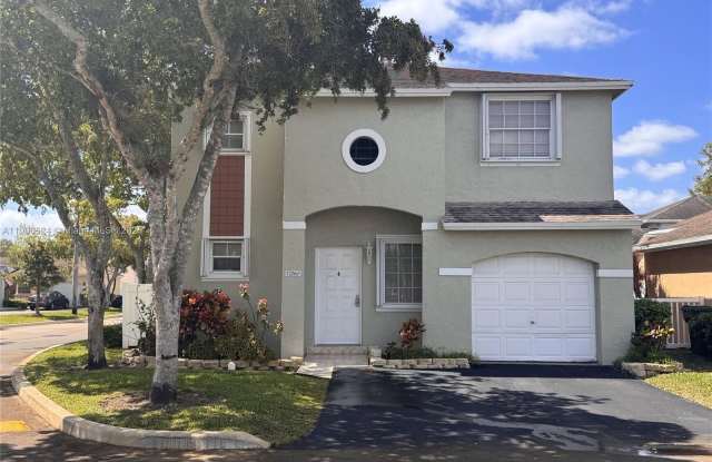 12060 NW 13th St photos photos