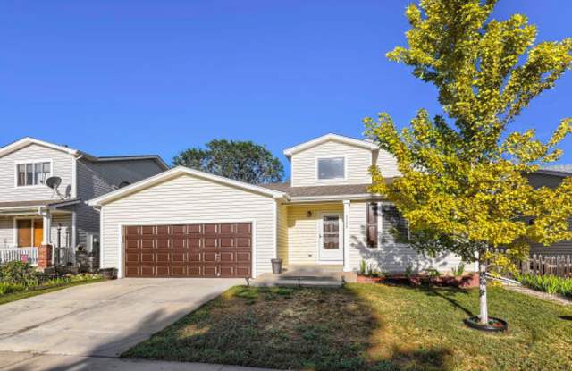 Beautifully Updated 4-Bedroom Wolf Creek Home with Finished Basement & Private Backyard Gallery 1