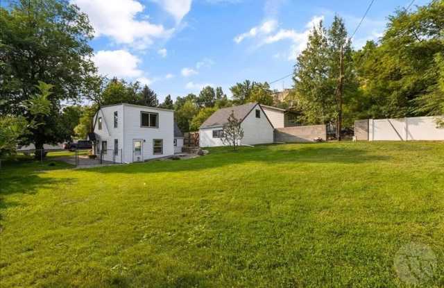Gorgeous 4-Bedroom Home with Expansive Landscaped Yard  Off-Street Parking – Fully Furnished! photos photos