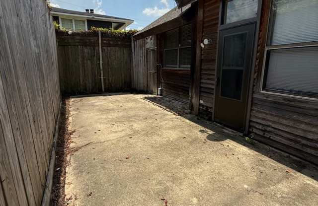 Cozy Efficiency with private backyard photos photos
