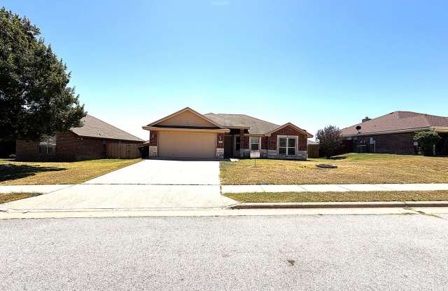 Available NOW!!!! Beautiful 4 bedroom, 2 bath home with a 2 car garage with remote opener. The property has a fireplace and privacy fenced yard. Gallery 1