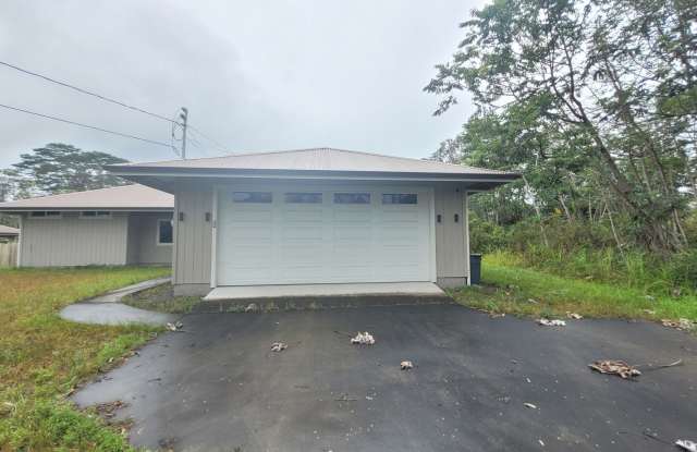 This 3-bedroom, 2-bath home in Orchidland Subdivision photos photos