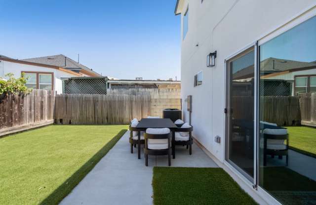 Spacious turfed yard! photos photos