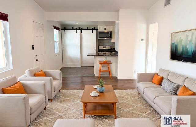 Beautifully Maintained 4-Bedroom Home with Private Backyard photos photos