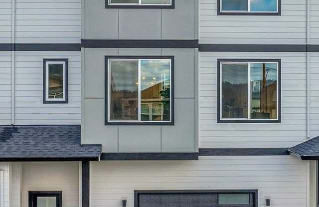 Brand New Spacious and Light-Filled Condo Offering an Open Layout, Island Kitchen, and Outdoor Deck - 3674 Southwest Sandlewood Lane, Gresham, OR 97080