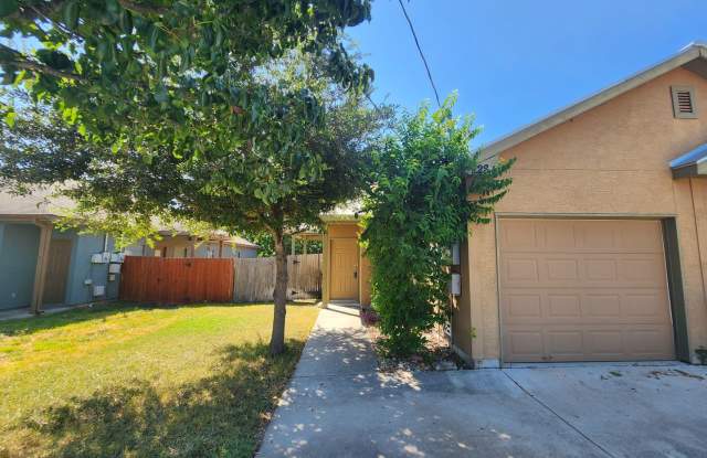 3/2/1 Duplex w/ Stained Concrete Floors Throughout! Refrigerator Included /Fenced in Yard / CISD photos photos