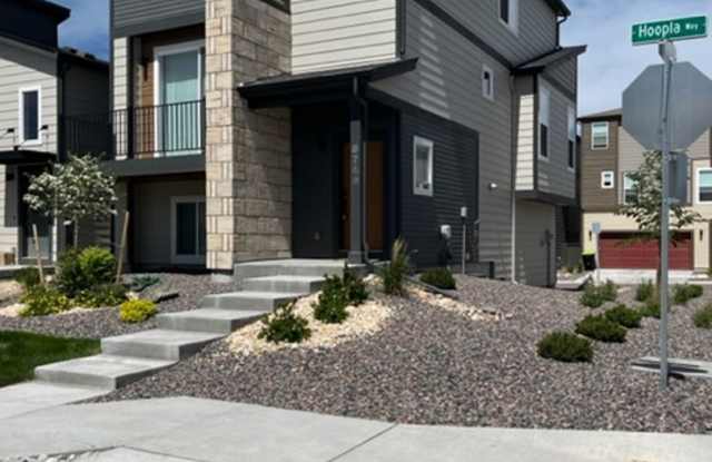 MODERN THREE STORY TOWNHOME WITH 2 CAR GARAGE IN WOLF RANCH! photos photos