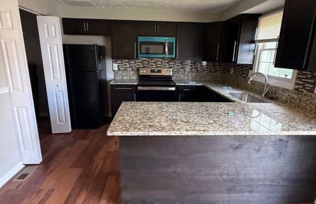 Spacious Townhome for Rent! Central Air! Finished Basement! Gourmet Kitchen! Available Now! Gallery 4