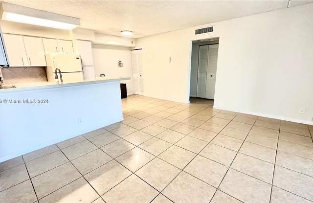 941 Lyons Rd - 941 Lyons Road, Coconut Creek, FL 33063
