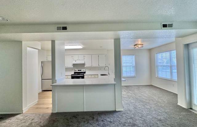 2 WEEKS FREE RENT! Beautifully Remodeled, Easy Living Townhome. Location, Location! photos photos