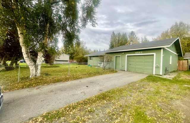 Adorable 3 bedroom Ranch home with several out buildings and a fenced in yard! Great Commute location in Machetanz school district! photos photos