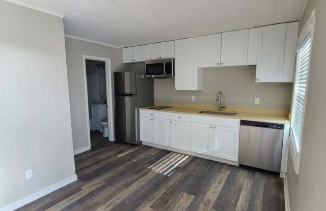 Recently Renovated Apartments, Featuring Modern Finishes, Stainless Appliances, Garage Space and Pet Friendly photos photos