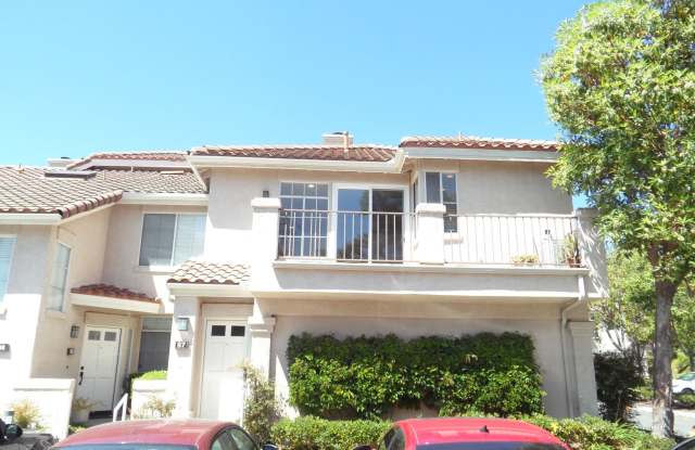 Upstairs 2BR; 2BA end-unit condo w/ 1 car attached garage Gallery 1