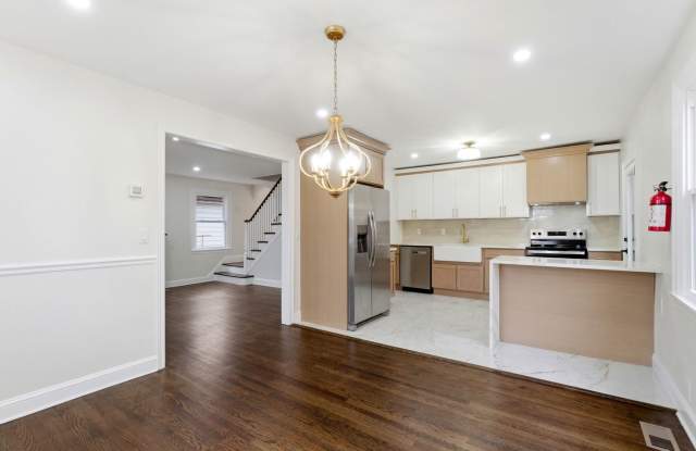 Newly Renovated Pennsauken Rental with Sunroom-Style Back Room, Glass Wall  Basement photos photos