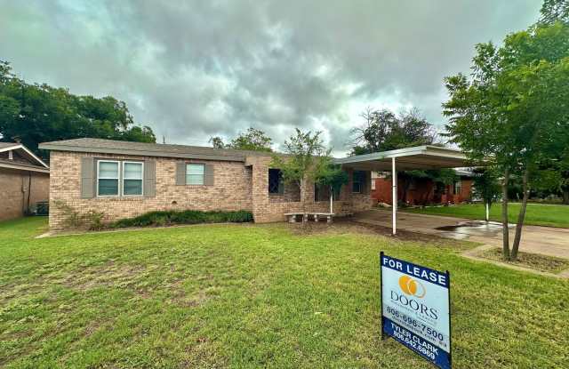 Spacious Four Bedroom - Available Now! Just minutes from Texas Tech. photos photos