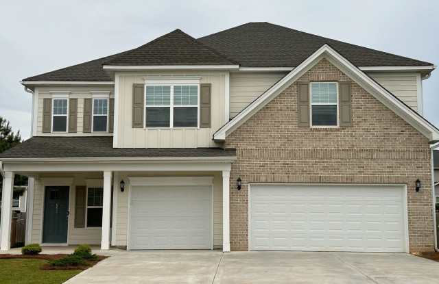 Step into luxury living at 559 Malachite Lane in the prestigious Portrait Hill community of Chapin! photos photos