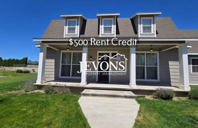 $500 Rent Credit - Spacious 4-bedroom home with fully equipped kitchen and 2-car garage near Stewart Park – Easy access to US-12! photos photos