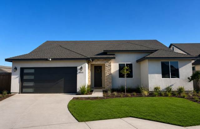 Newly Built 3-Bedroom Home with Attached 2-Car Garage, Solar Panels, Split-Wing Layout & Quartz Countertops Gallery 1