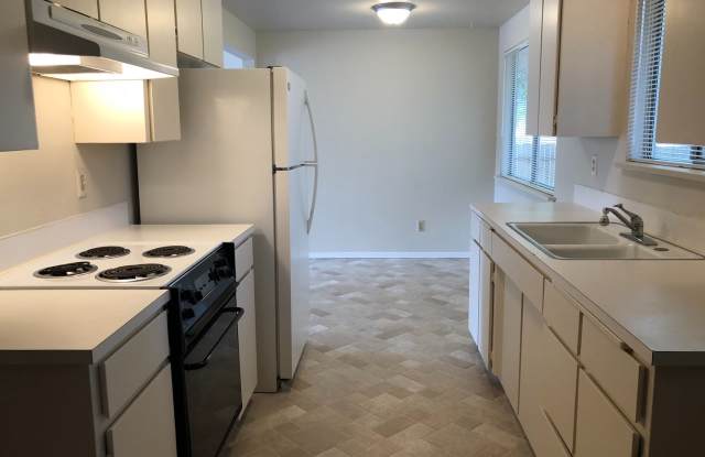 Clean  Move-In Ready 2-Bedroom Home with Garage and Large Fenced Yard photos photos