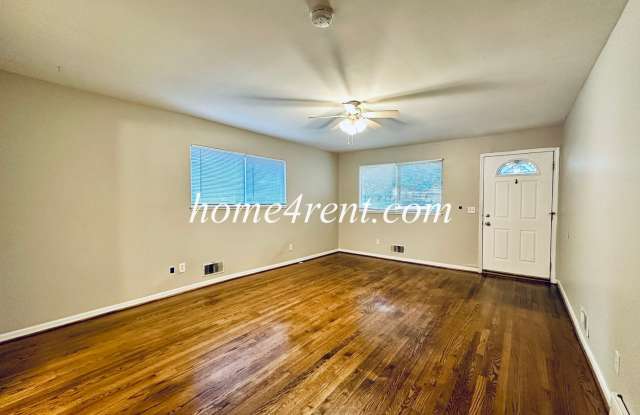 Great home in the desirable Waldo area with wood floors, fenced yard and basement! Gallery 4