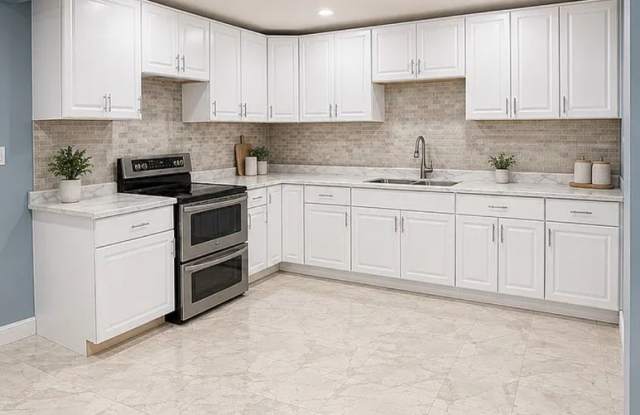 HALF OFF SECURITY DEPOSIT! Fully Renovated 3BR Home with Huge Yard & Off-Street Parking - Section 8 Welcome! Gallery 4