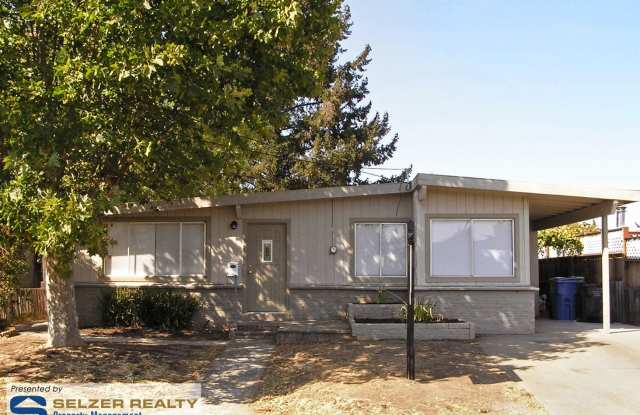 Surprisingly roomy 4 bd. house; convenient location near schools  shopping! photos photos