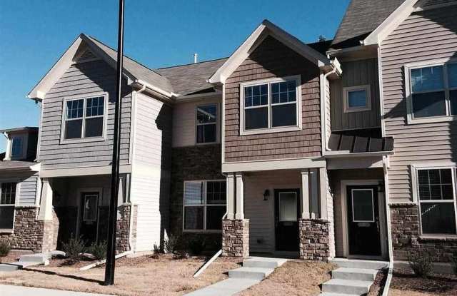 Room in 3 Bedroom Townhome at Pilatus Dr photos photos