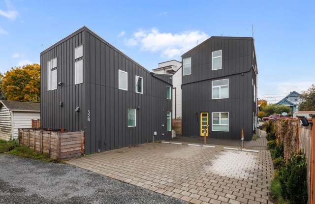 Modern Greenwood Living with a Private Yard, Rooftop Deck & Dedicated Parking! Gallery 1