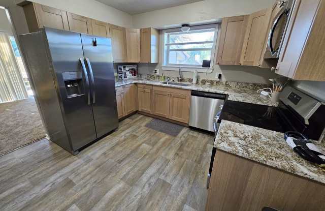 Pet friendly split-level 3 bedroom, 1 bathroom bi-attached home! photos photos