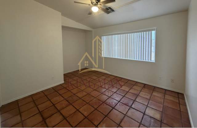 Charming Home with Saltillo Tile, Arched Openings & Fenced Backyard photos photos