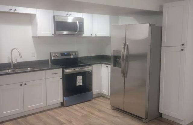 Spacious 3-Bedroom Basement Apartment – All Utilities Included photos photos
