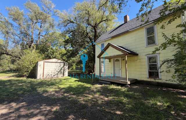 $1,199 | 4BR Farmhouse w/ Detached Shop, Creek Access & New HVAC | Newton Gallery 1