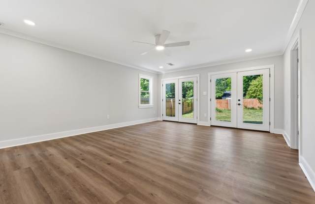 Beautifully renovated 3-bedroom bungalow near downtown with fully fenced yard! Gallery 3
