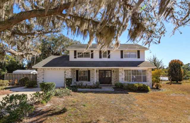 Updated 4-Bedroom Longwood Rental with Pool  Lawn Care Included – Move-In Ready photos photos