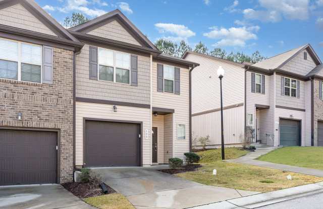 Welcome home! This pristine, end-unit townhome combines modern comfort, thoughtful upgrades, and low-maintenance living in an unbeatable Holly Springs location. Gallery 3