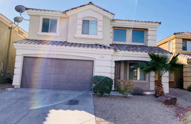 Beautiful & large Rhodes Ranch guard gated community 4 bedroom home with the master bedroom downstairs and a big loft upstairs! With a covered backyard patio. Community features pool, spa, gym, and parks! photos photos