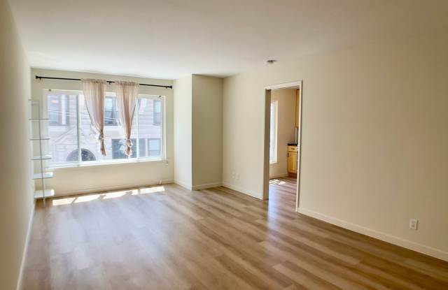 BRIGHT 1BR W/ Parking Available. ON-SITE LAUNDRY! STUNNING Roof Deck! Elevator! photos photos