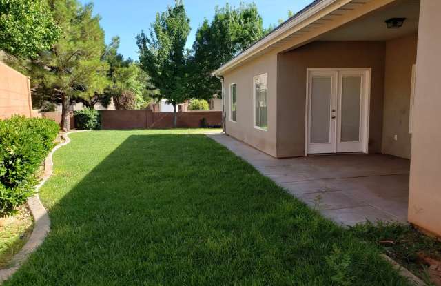 Fenced 4 bed 2 bath home with 3 car garage - Dog Friendly! photos photos