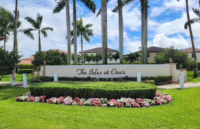 Newly renovated 4 bedroom house in Isles at the Oasis. No carpet. Low maintenance back yard. photos photos