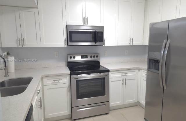 1120 NW 124th Place 101, Miami, FL 33182 photos photos