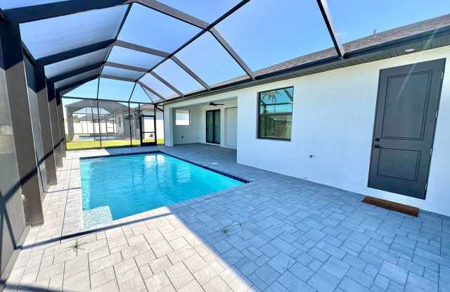 Brand New Construction Pool Home - 3 Beds + Den, 2 Baths, 3 Car Garage - 829 Northeast 11th Street, Cape Coral, FL 33909