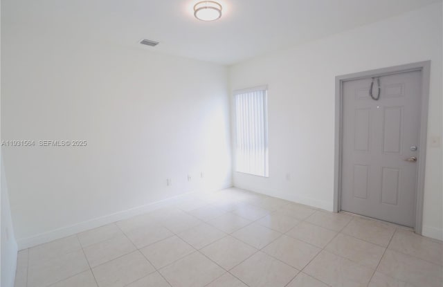 6151 NW 182nd Ln - 6151 Northwest 182nd Lane, Country Club, FL 33015