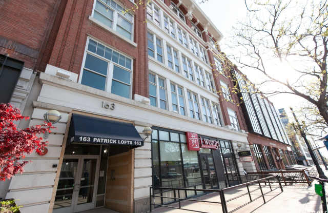 Historic Downtown Loft | Secure Garage Parking, Rooftop Lounge & Turn-Key Options photos photos