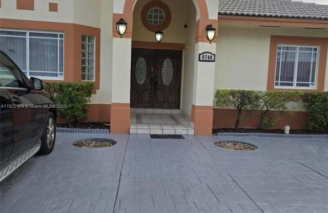 8740 NW 142nd St - 8740 Northwest 142nd Street, Miami Lakes, FL 33018