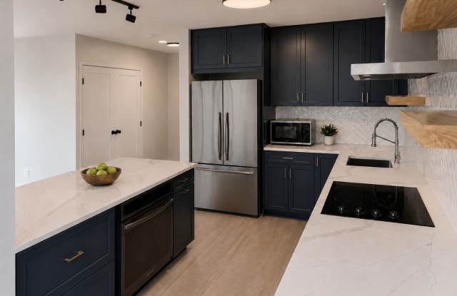 Renovated 1 bdrm /1.5 bath Condo, Utilities & Parking Included - Available Now! Gallery 1