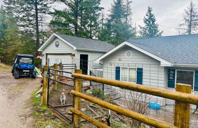 Huge fenced yard, chicken coop and fruit trees! - 115 Tamarack Woods Drive, Lakeside, MT 59922
